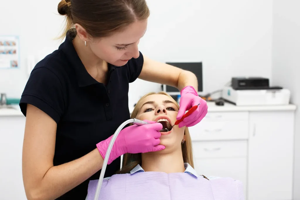 Patient undergoing a fluoride treatment from Parkway Family Dental